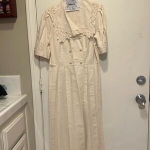 Laura Ashley cream colored dress with pretty collar and sleeves. Size 10